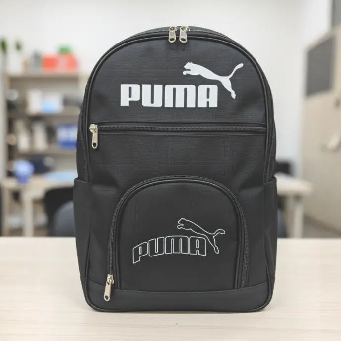 The essential black Puma backpack, featuring a durable design and the iconic white logo. Perfect for carrying books, gym gear, or daily essentials.